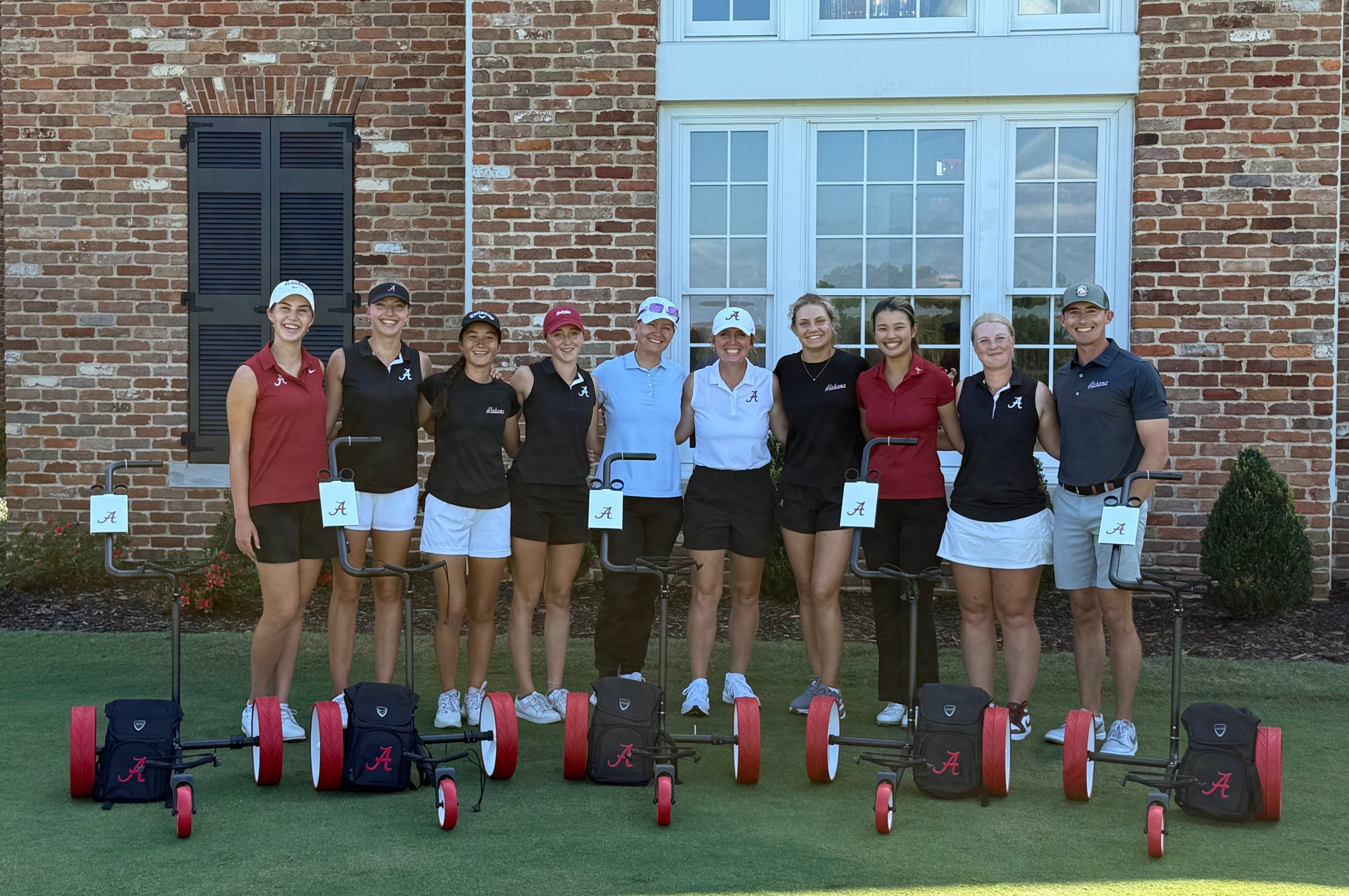 University of Alabama Women's Golf team with JuCad carts